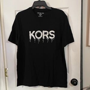 Michael Kors Black Tee with white embellished logo. Size L